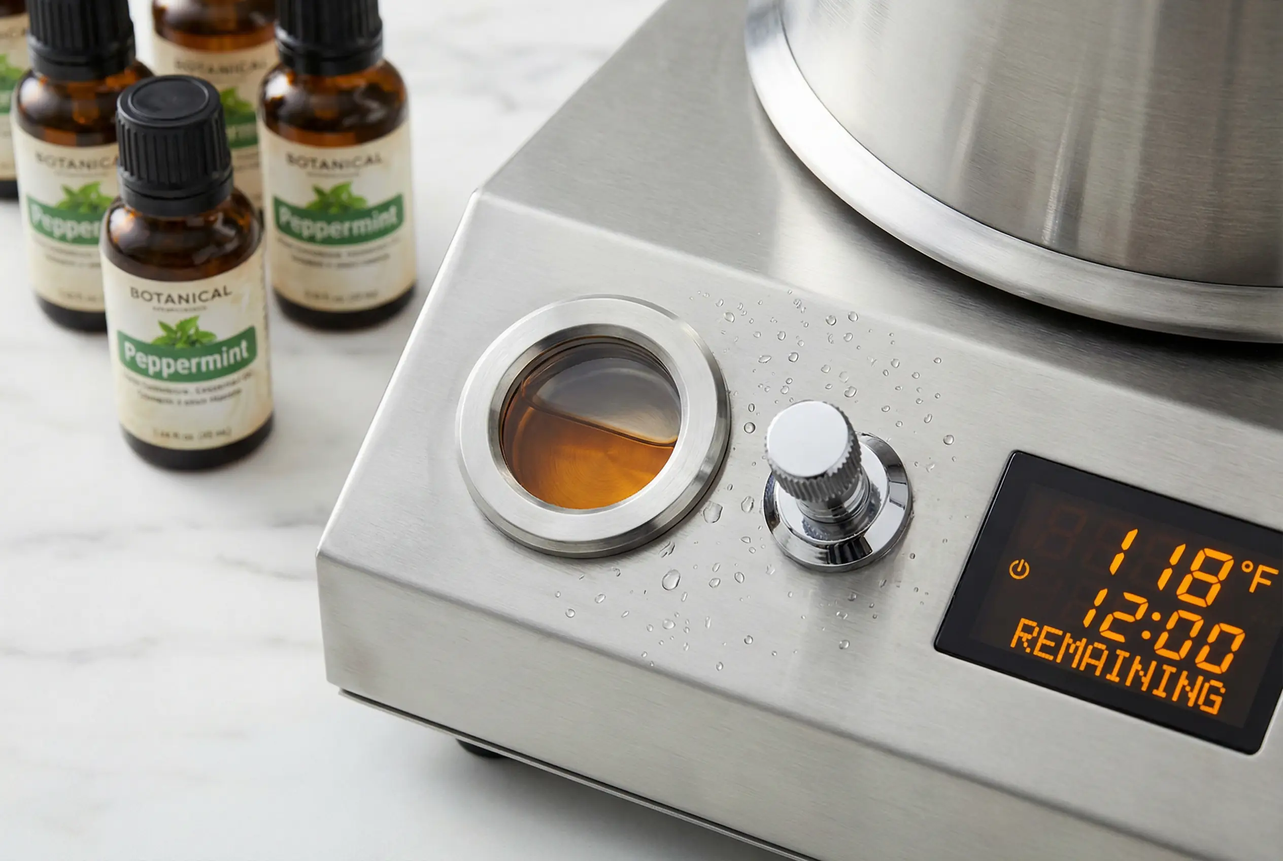 Stainless steel aromatherapy reservoir for steam shower with digital controls, essential oil chamber, and injection mechanism